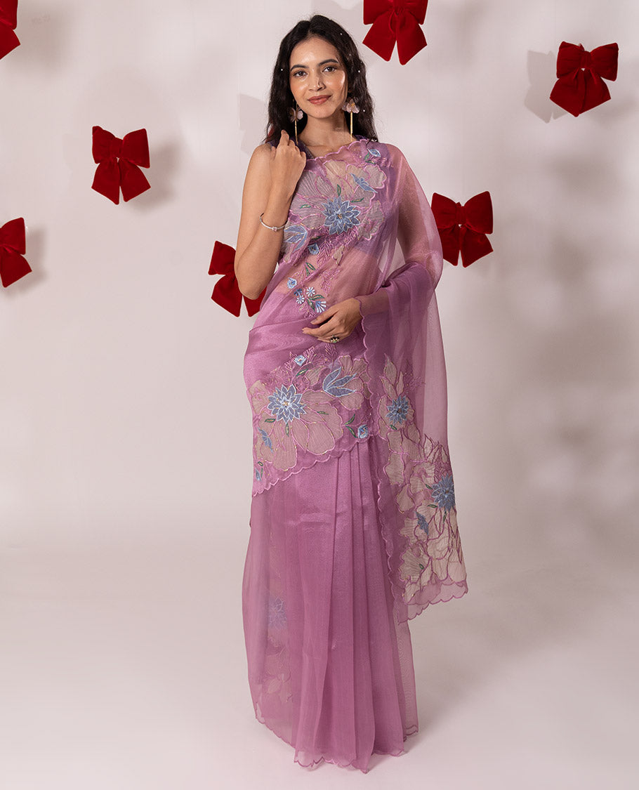 Pink floral embroidered with golden outlined organza saree, scallop border, and floral embroidered pallu