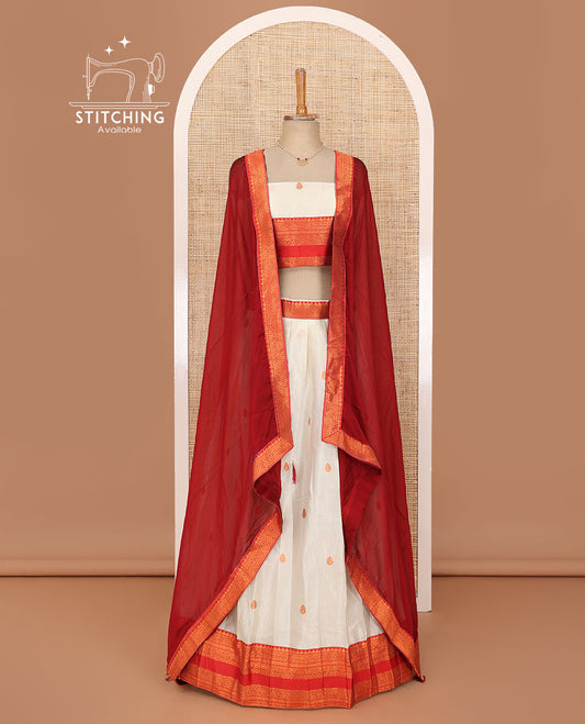 White lehenga set, buttas with contrast traditional zari border skirt, matching blouse and contrast zari border plain dhavani
