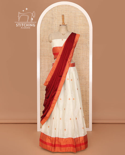 White lehenga set, buttas with contrast traditional zari border skirt, matching blouse and contrast zari border plain dhavani