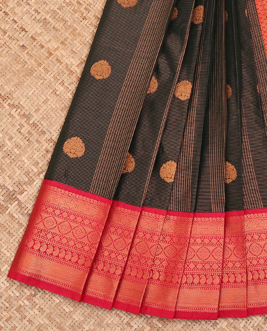 Black Budget Silk Saree, Spotlighted with Zari Stripes and Zari Buttas All Over Its Body, Complemented by a Contrast Traditional Zari Border, Grand Jaal Pallu, and Paired with a Contrast Blouse
