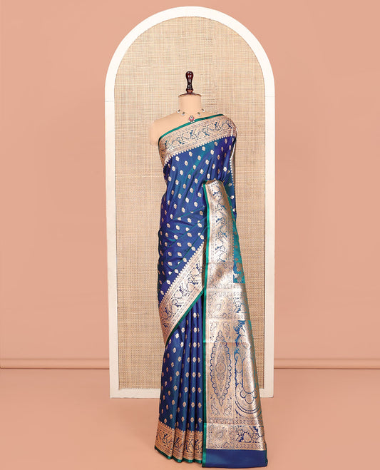 Blue Banarasi Nylon Saree, Majestically Detailed with Zari Buttas, Highlighted by a Floral Creeper Zari Border, Intricate Pallu, and a Matching Blouse