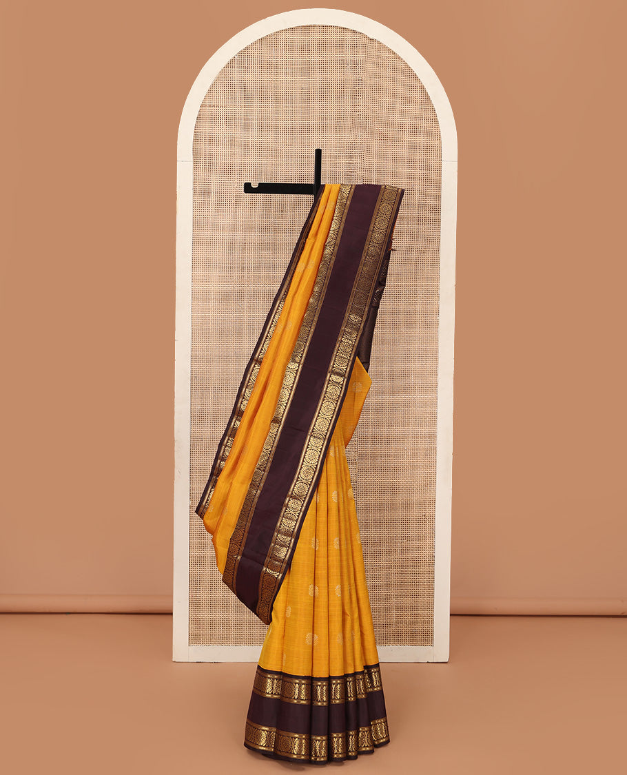 Mustard striped with chakram motifs Kanchipuram silk saree, contrast rettai pettu zari border of kathir, and poo chakram designs