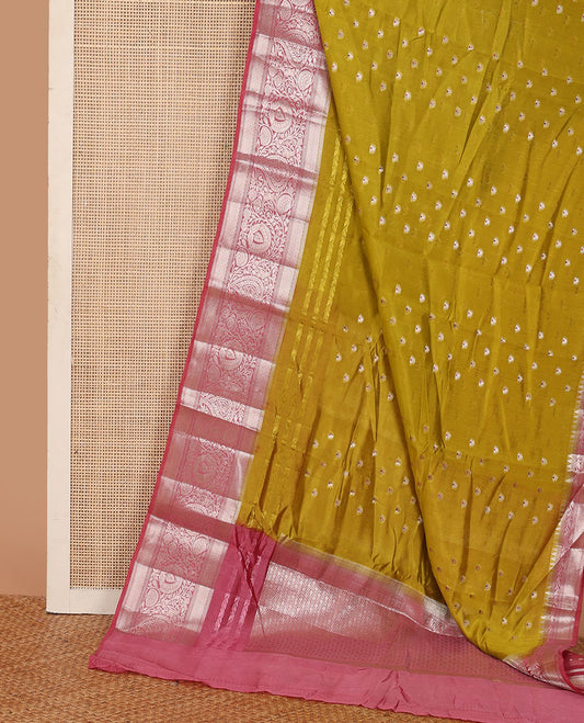 Green meena buttas raw mango silk saree, contrast traditional zari border of floral creeper, and jaal pallu