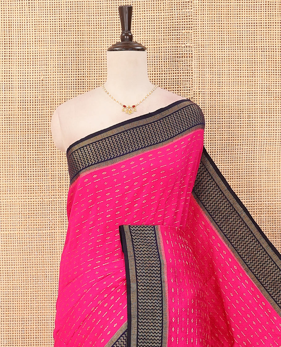 Pink zari buttas art dupion saree, contrast chevron design border, and pallu of diamond pattern in sequins stripes