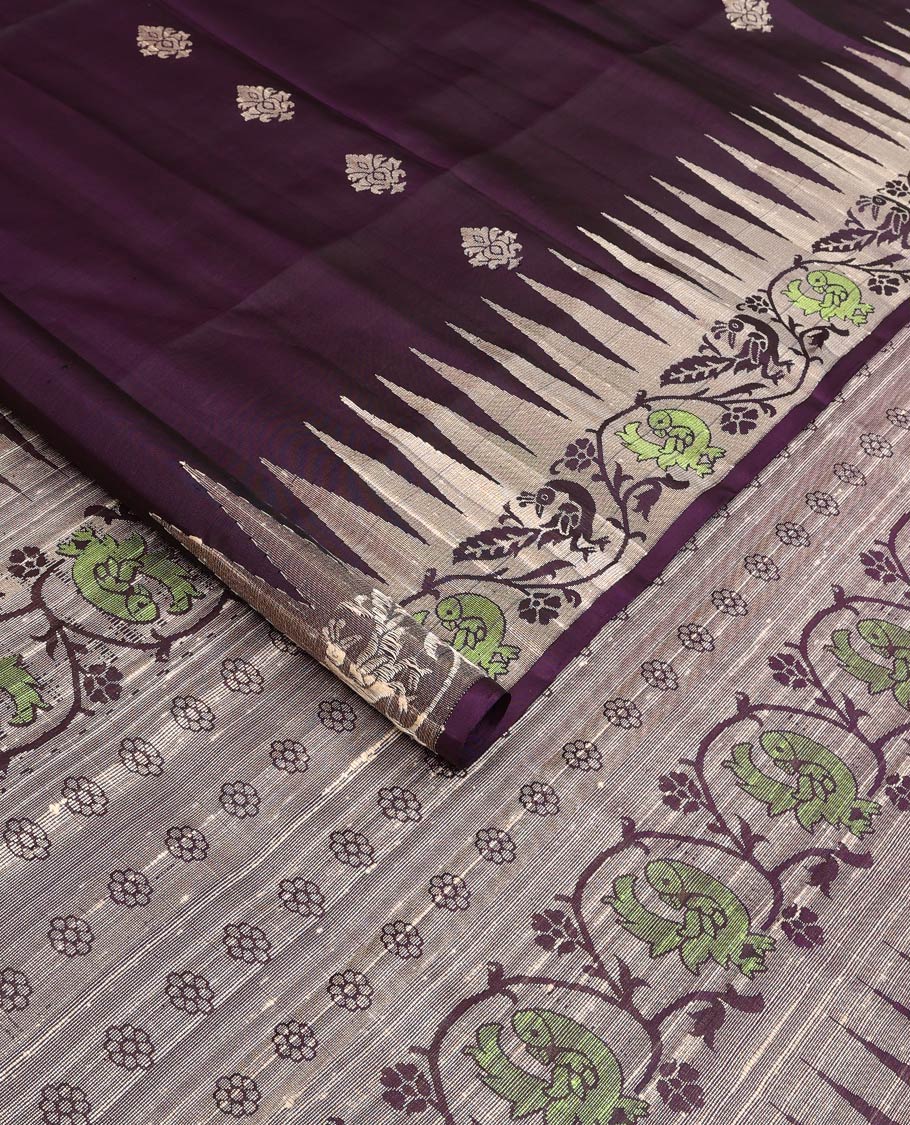 Purple buttas woven soft silk saree, temple border of kodi visiry and mayil designs, and pallu of floral and kodi mayil designs