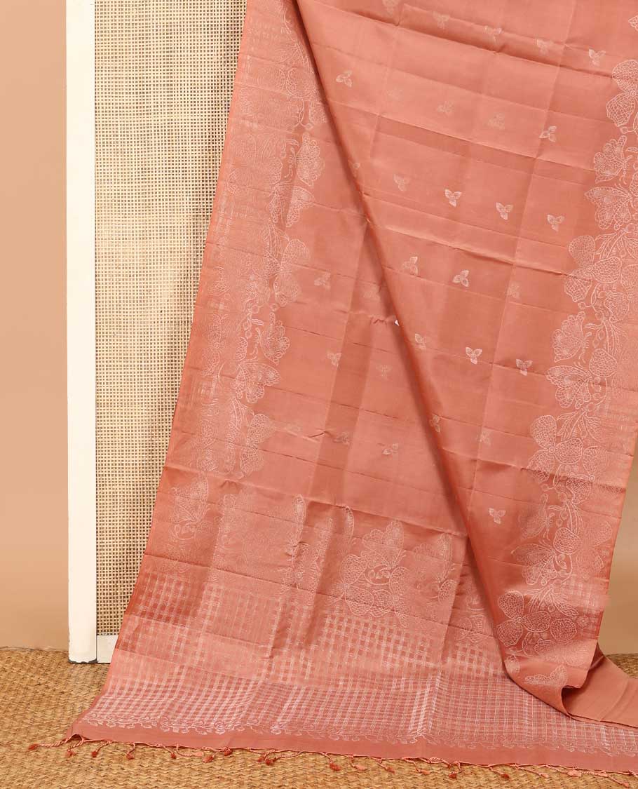 Peach three-leaf zari buttas soft silk saree, floral vine zari woven border, and zari-rich checked pallu