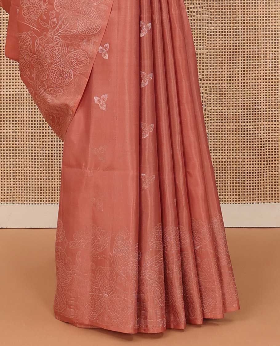 Peach three-leaf zari buttas soft silk saree, floral vine zari woven border, and zari-rich checked pallu