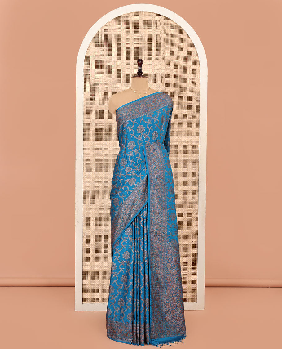 Blue Mushru Silk Saree, Mesmerized with Floral Jacquard Design on Its Body, Sparsely Sparkled Zari Border, Zari-Rich Pallu of Floral Jaal Designs, and Paired with a Matching Blouse