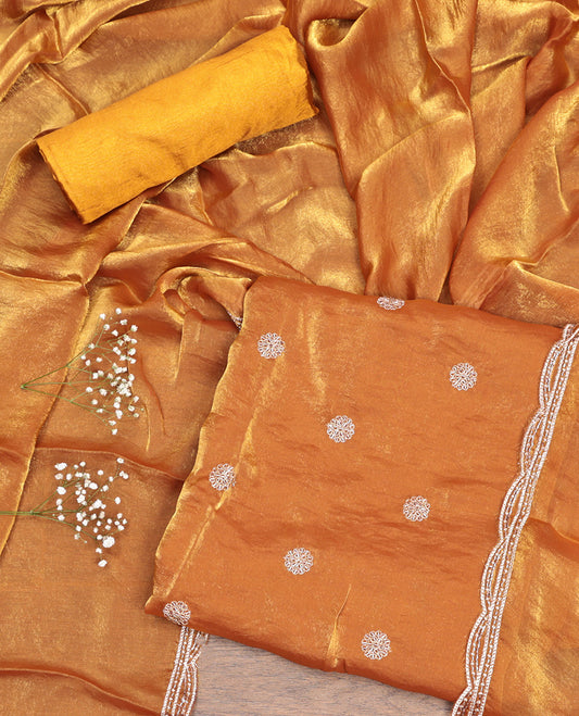 Mustard Material Churidar Set, Crafted with Floral Embroidered Motif on Its Top, a Matching Bottom, and Scallop Embroidered Border Dupatta