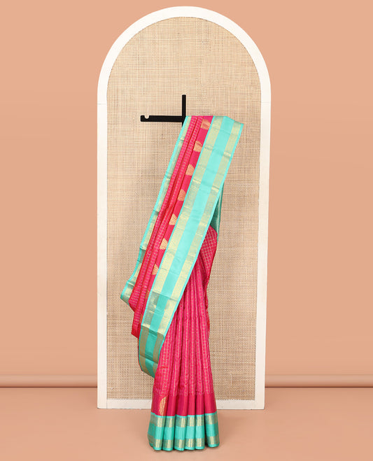 Pink Vasundhara Silk Saree, Masterfully Woven with Muthu Checks and Manga Buttas All Over Its Body, Complemented by a Contrast Rettai Pettu Border of Rekku, and Kodi Visiry Designs, Grand Pallu, and Paired with a Contrast Blouse