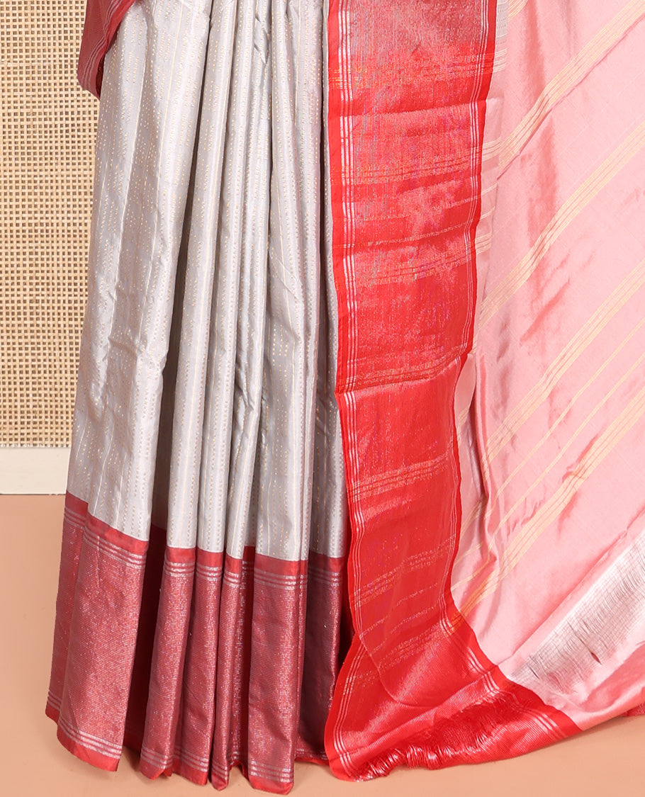 Grey Aarani Silk Saree, Subtly Sparkled with Zari Design All Over Its Body, Complemented by a Contrast Zari Striped Border, Striped Pallu, and Paired with a Matching Blouse