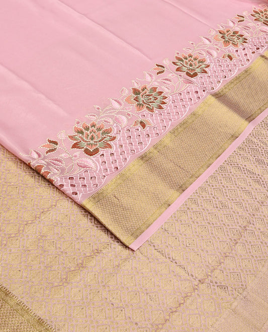 Pink plain satin silk saree, zari border of floral creeper design, and zari rich jaal pattern