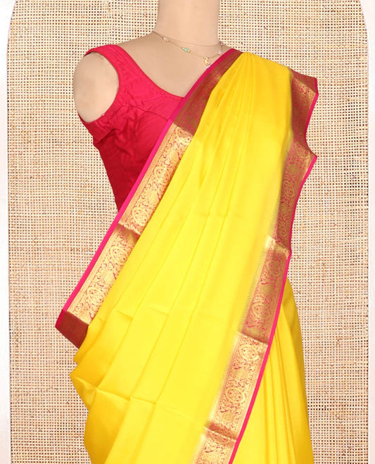 Yellow Plain Mysore Silk Saree, a Contrast Paisley-Floral Zari Border, Intricately Designed Pallu, and a Contrast Blouse