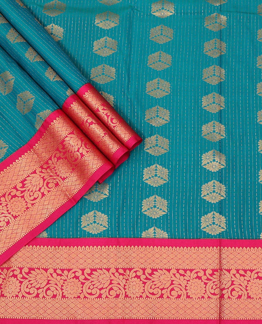 Blue Art Silk Pavadai Material Set, Beautified with Zari Stripes and Zari Buttas Skirt, Complemented by a Contrast Floral-Jaal Patterned Zari Border, and Paired with a Contrast Blouse