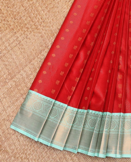 Red Budget Silk Saree Accentuated Up with Zari Buttas and Zari Stripes, Complemented by a Contrast Traditional Zari Design Border, Subtly Designed Jaal Pallu, and Paired with a Contrast Blouse