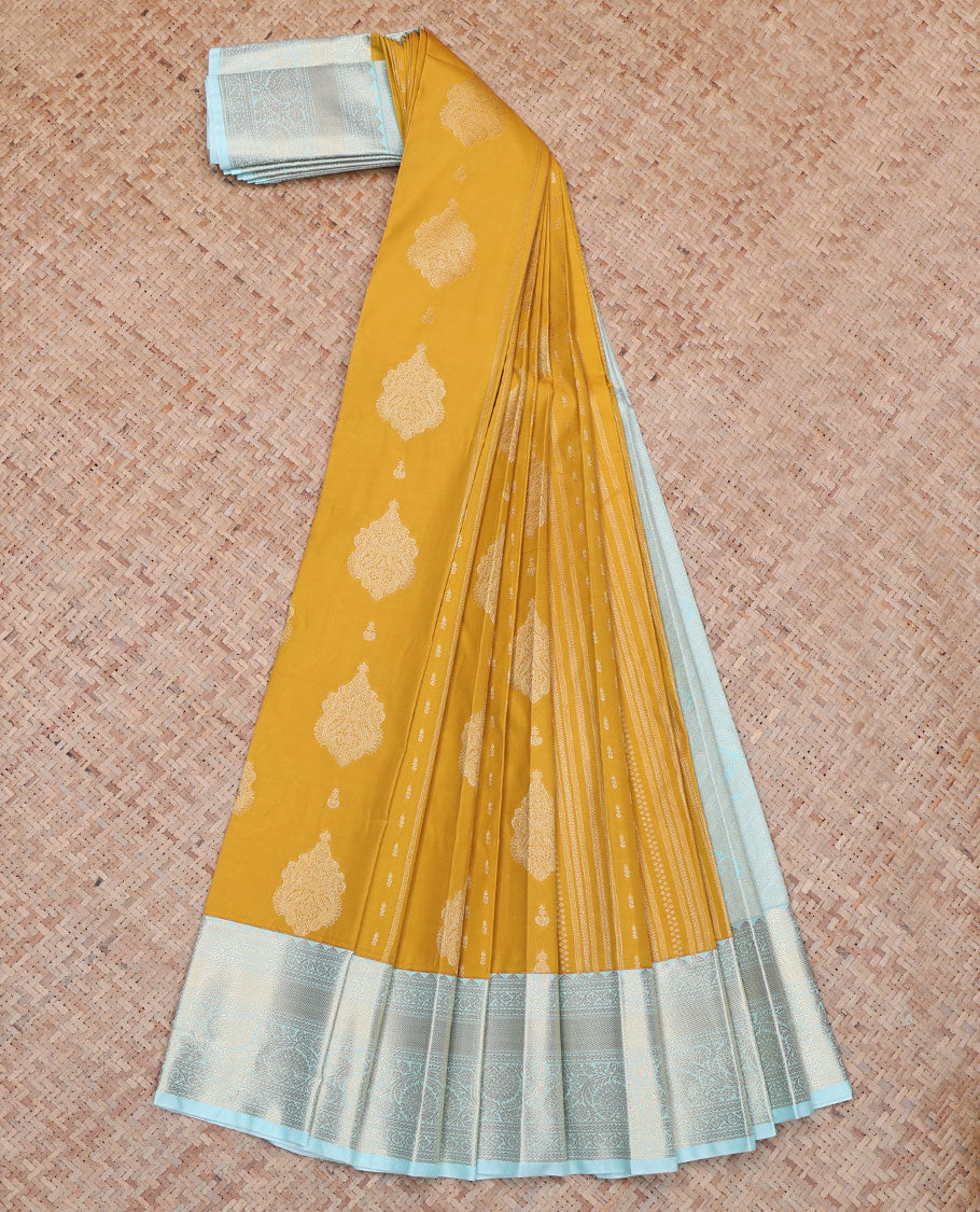Yellow Budget Silk Saree, Decorated with Zari Buttas All Over Its Body, Complemented by a Contrast Traditional Zari Design Border of Floral Creeper Designs, Pallu Features Diagonal Designs, and Paired with a Contrast Blouse