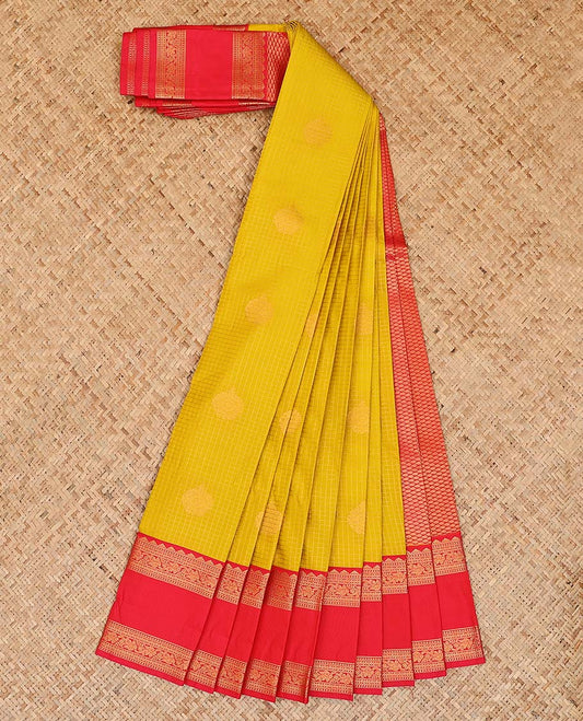 Yellow checked and zari buttas gift saree, contrast traditional design rettai pettu border, and pallu of intricate designs