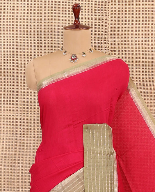 Red Plain Assam Silk Saree, Complemented by Captivating Contrast Border Featuring Traditional Zari Designs, Gleaming Zari Woven Pallu, and Paired with a Contrast Blouse