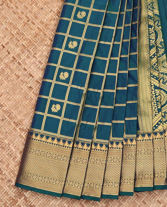 Blue Budget Silk Saree, Elegantly Detailed with Peacock-Chakram Butta Enclosed Checks All Over Its Body, Highlighted by a Temple Zari Border of Traditional Designs, Pallu Depicts Mughal-Style Designs, and Paired with a Matching Blouse