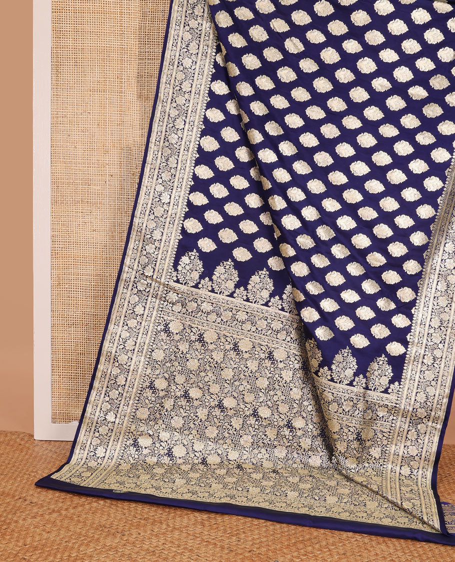 Navy blue banarasi silk saree with zari buttas, self-border of floral creeper designs & pallu steeped with floral designs