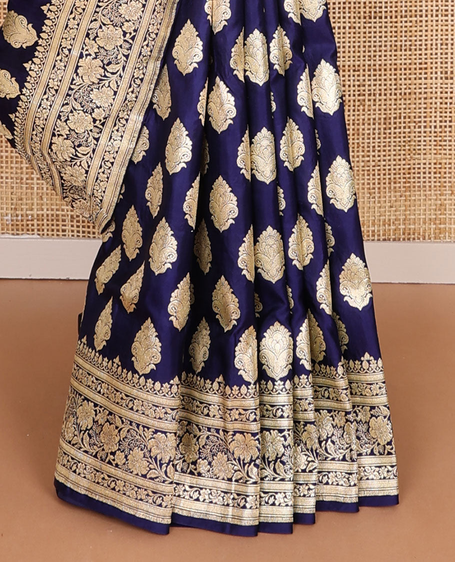 Navy blue banarasi silk saree with zari buttas, self-border of floral creeper designs & pallu steeped with floral designs