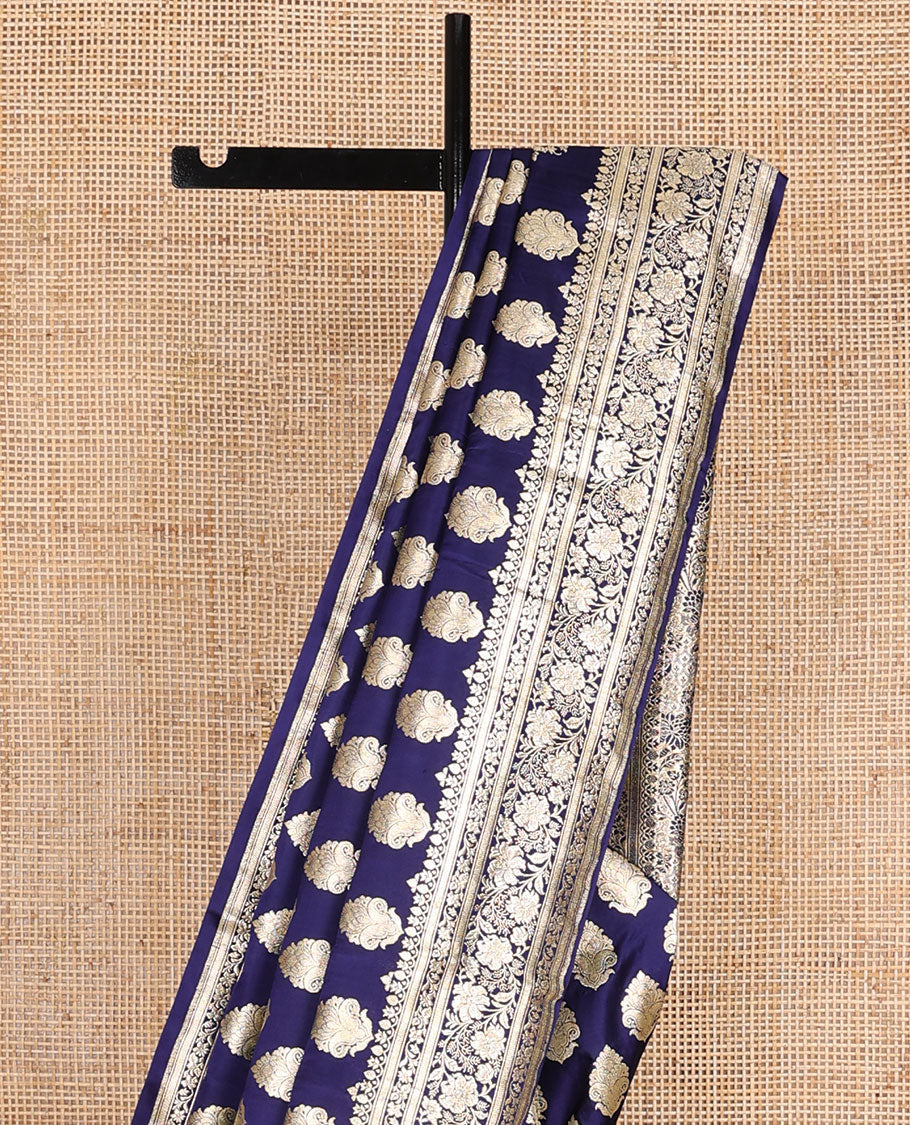 Navy blue banarasi silk saree with zari buttas, self-border of floral creeper designs & pallu steeped with floral designs