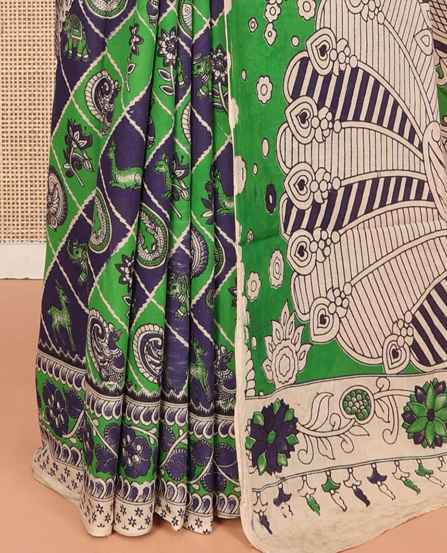 Blue-Green Machine-Printed Kalamkari Cotton Saree Features Butta Enclosed Jaal, Floral Printed Border, Pallu of Peacocks, and a Contrast Blouse