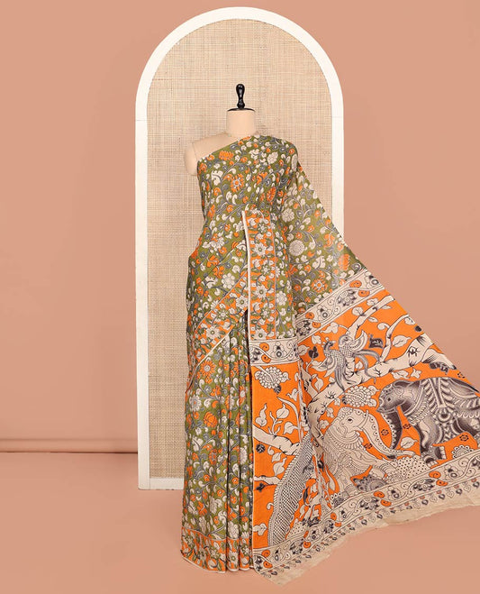 Green Machine-Printed Kalamkari Cotton Saree Features Floral Vine Design, a Floral Printed Border, Pallu of Fauna Motifs, and a Contrast Blouse