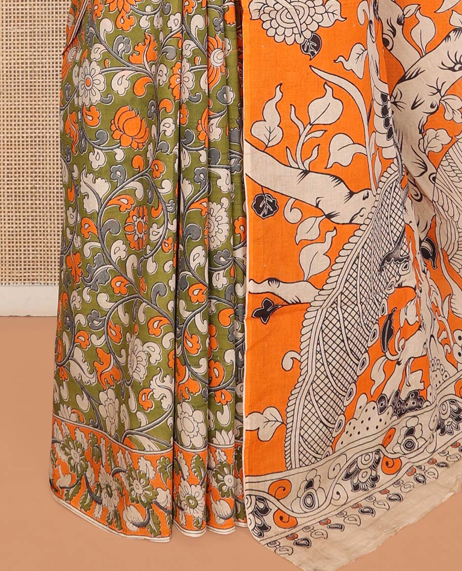 Green Machine-Printed Kalamkari Cotton Saree Features Floral Vine Design, a Floral Printed Border, Pallu of Fauna Motifs, and a Contrast Blouse