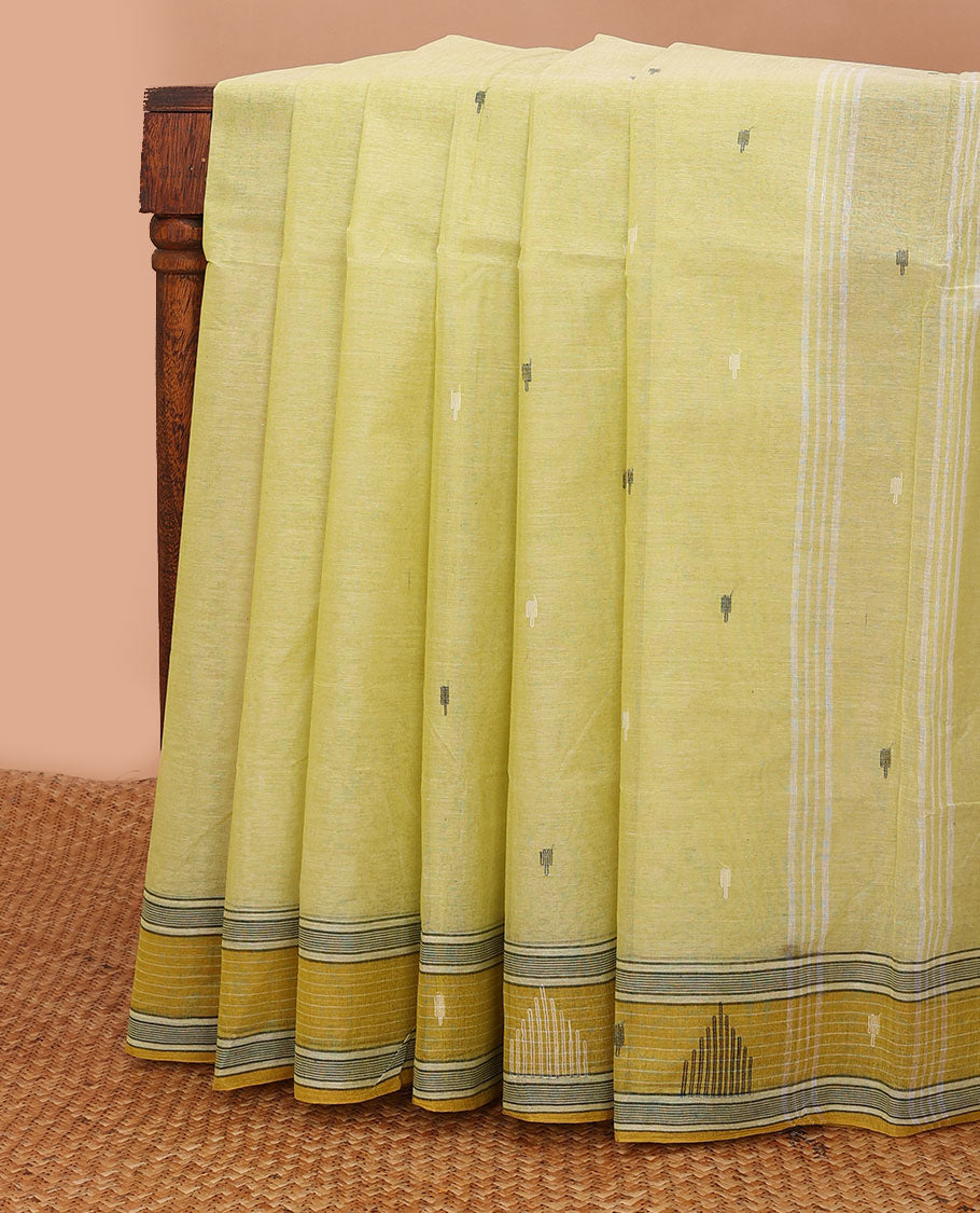 Pastel yellow buttas Bengal cotton saree, contrast temple border & pallu of stripes & buttas