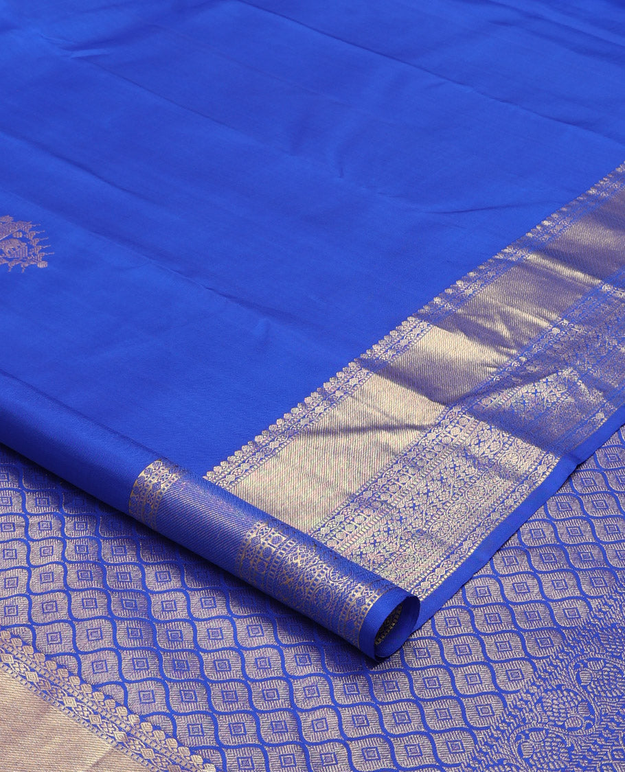 Royal blue zari buttas woven Kanchipuram silk saree, zari border of thilakam mokku, muthu, rudraksham, kodi visiry, chakram, and kathir designs, and jaal pallu