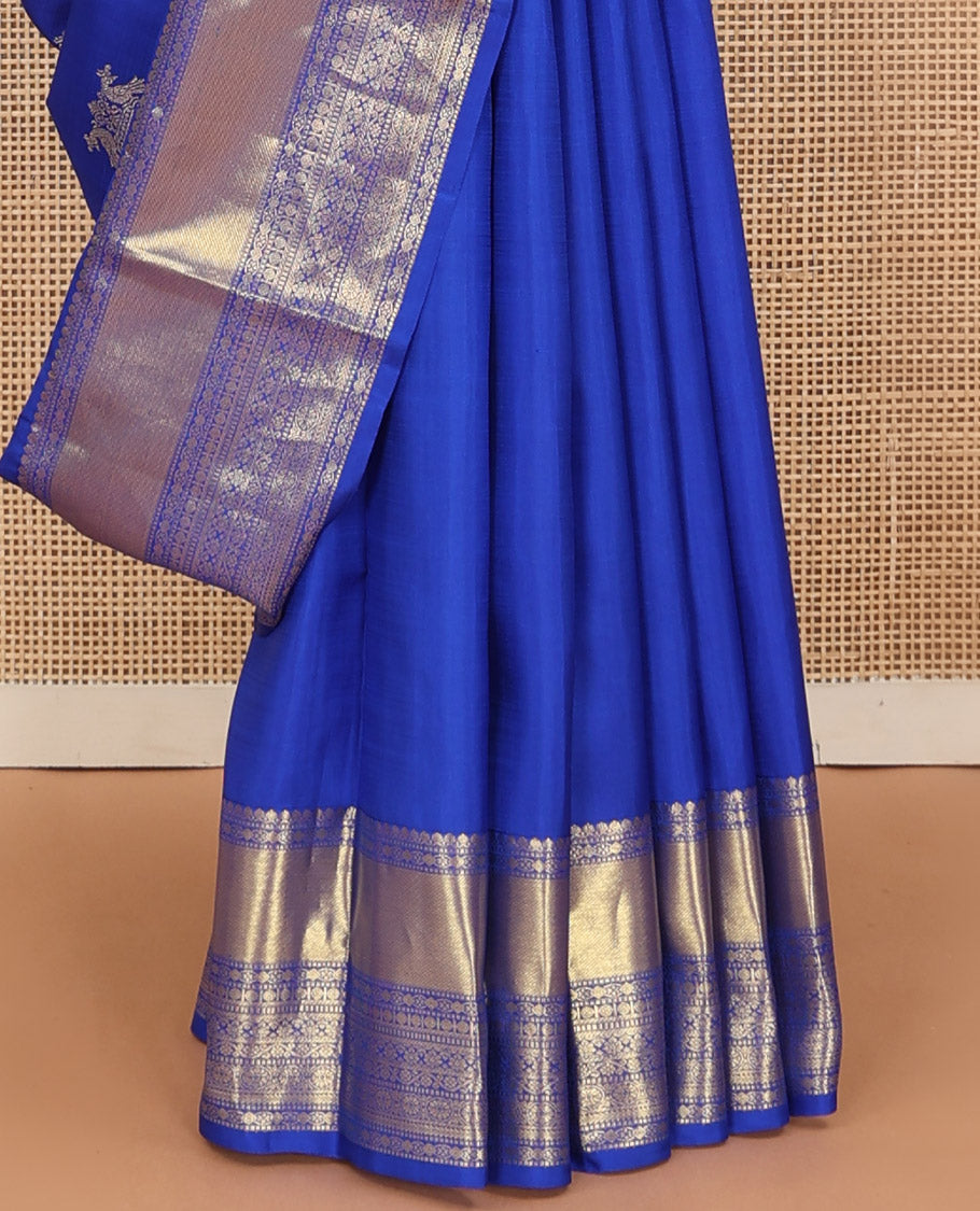 Royal blue zari buttas woven Kanchipuram silk saree, zari border of thilakam mokku, muthu, rudraksham, kodi visiry, chakram, and kathir designs, and jaal pallu