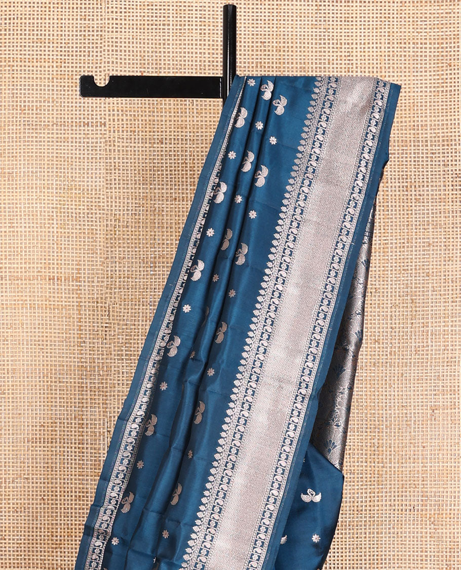 Blue raw mango silk saree with swan & flower buttas, traditional zari border & floral design pallu