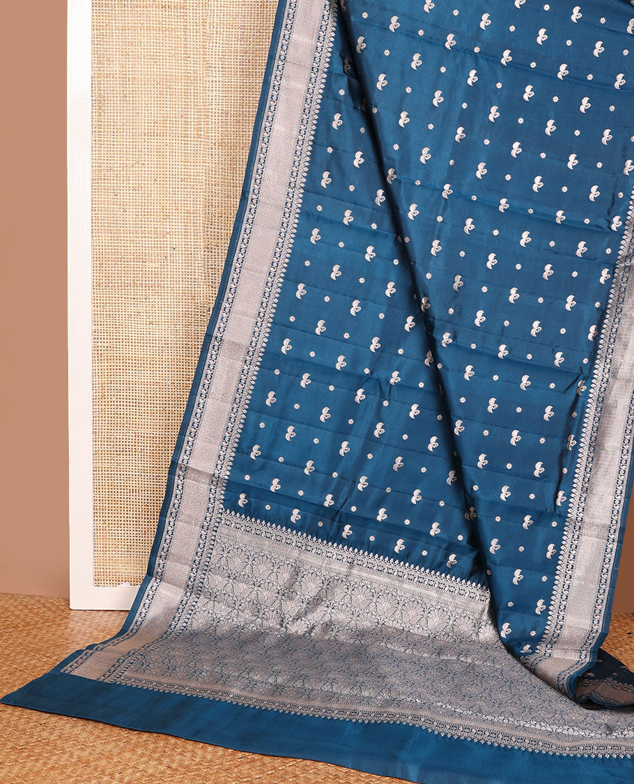 Blue raw mango silk saree with swan & flower buttas, traditional zari border & floral design pallu