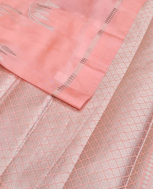 Peach floral buttas raw mango silk saree, zari border, and zari rich jaal pallu