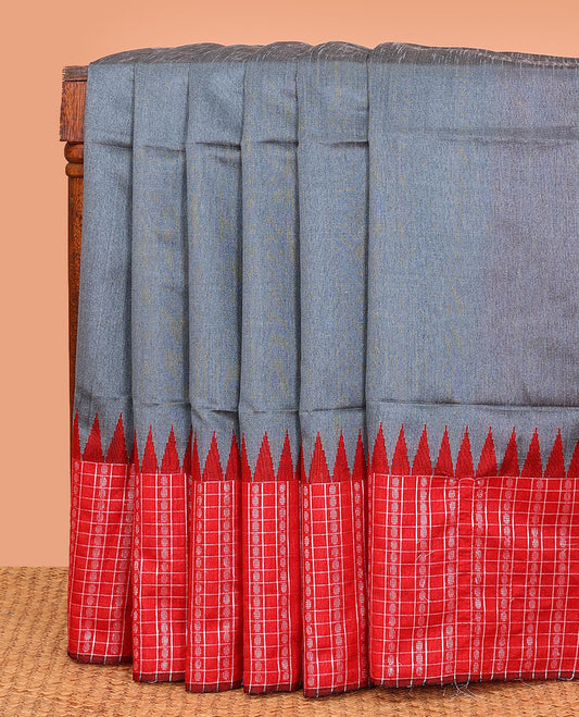 Grey plain dupion saree, contrast butta enclosed checked temple border, and buttas woven pallu