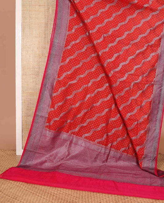 Red diagonal zig-zag floral vine woven fancy saree, zari border, and zari woven pallu