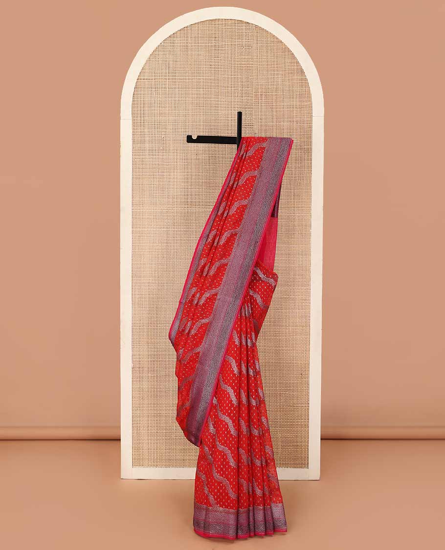 Red diagonal zig-zag floral vine woven fancy saree, zari border, and zari woven pallu