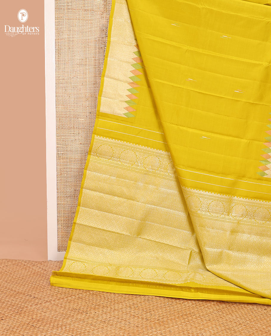 Yellow malli mokku buttas kancheepuram silk saree, meenakari temple zari border & pallu of chakram & jaal designs