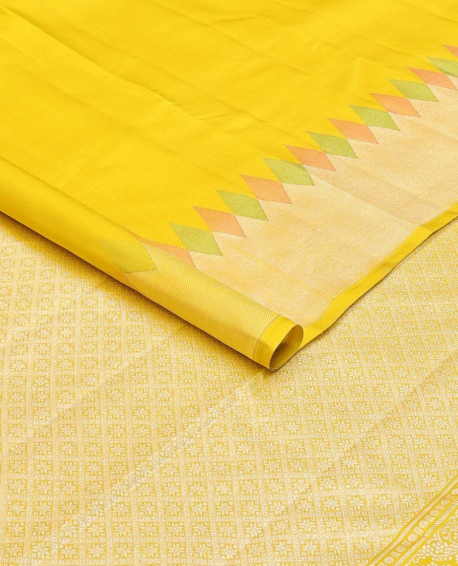 Yellow malli mokku buttas kancheepuram silk saree, meenakari temple zari border & pallu of chakram & jaal designs