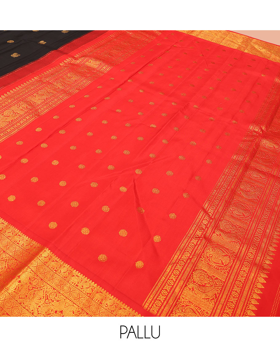 Black mayil chakram buttas Kanchipuram silk saree, contrast border of thilakam mokku, mayil, yaanai, and chakram designs, and chakram design pallu
