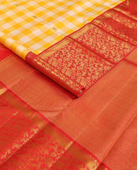 Yellow checked & chakram buttas Kanchipuram silk saree, contrast korvai border of salangai,muthu,vanki & vanasingaram designs & jaal pallu