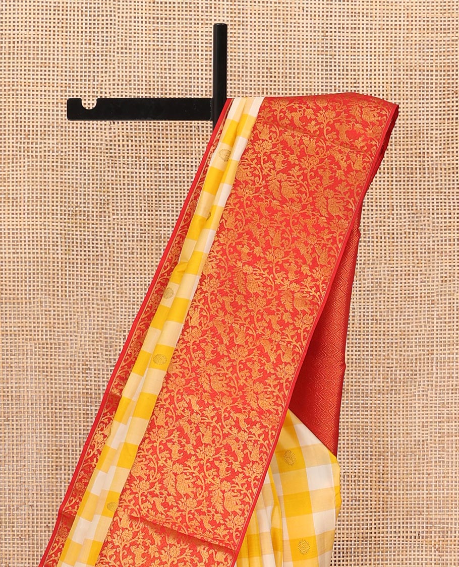 Yellow checked & chakram buttas Kanchipuram silk saree, contrast korvai border of salangai,muthu,vanki & vanasingaram designs & jaal pallu