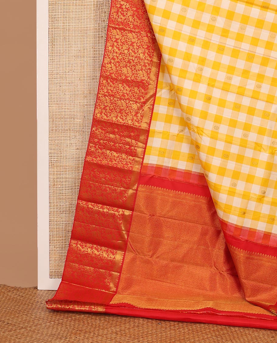 Yellow checked & chakram buttas Kanchipuram silk saree, contrast korvai border of salangai,muthu,vanki & vanasingaram designs & jaal pallu