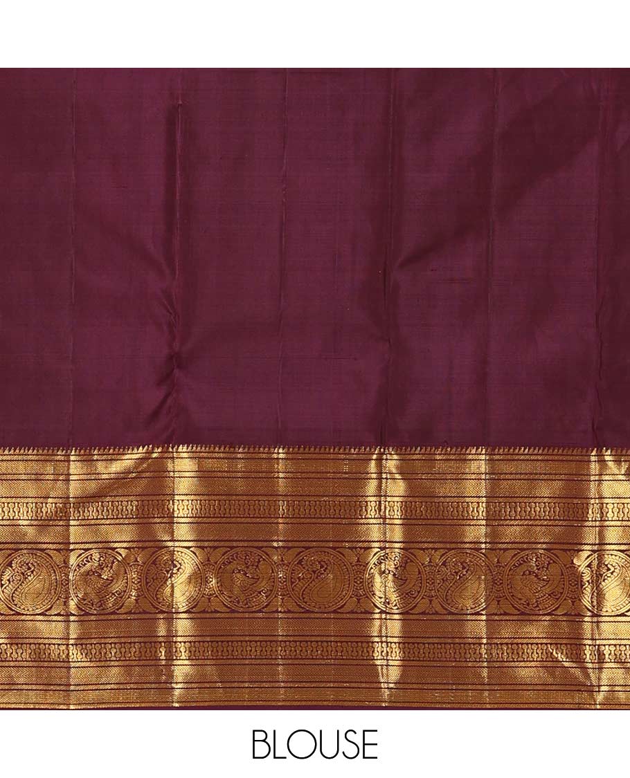 Orange annam chakram buttas Kanchipuram silk saree, contrast border of rekku, banaras, vanki, round mayil, and round manga, and jaal pallu