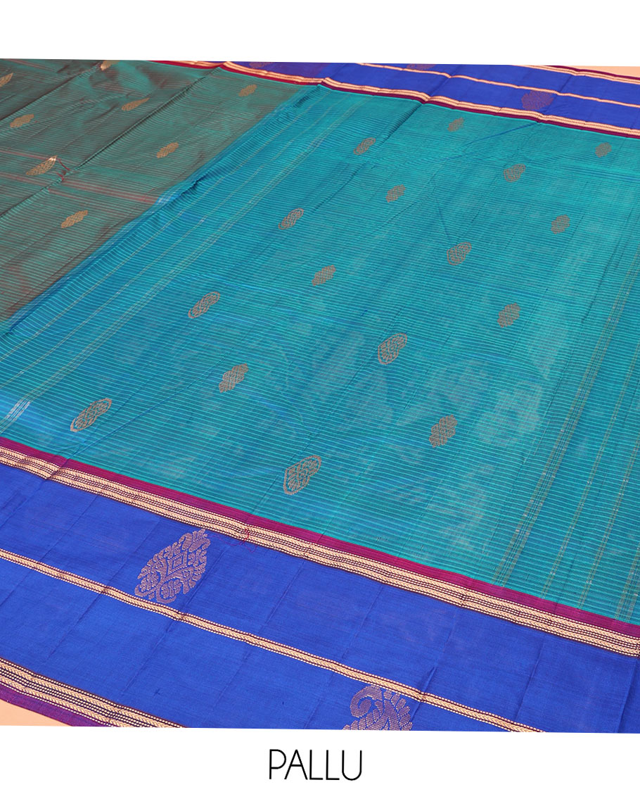 Blue Kanchipuram Silk Saree, Accentuated with Zari Buttas and Vazhaipoo Stripes on Its Body, Complemented by a Contrast Border of Muthu, Kathir, and Arumbu Manga Designs, Pallu of Zari Designs, and Paired with a Contrast Blouse