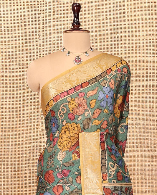 Green Kalamkari Saree, Beautified with Floral Vine Print, Complemented by Contrast Zari Border, Pallu of Flora-Fauna Print, and a Contrast Blouse