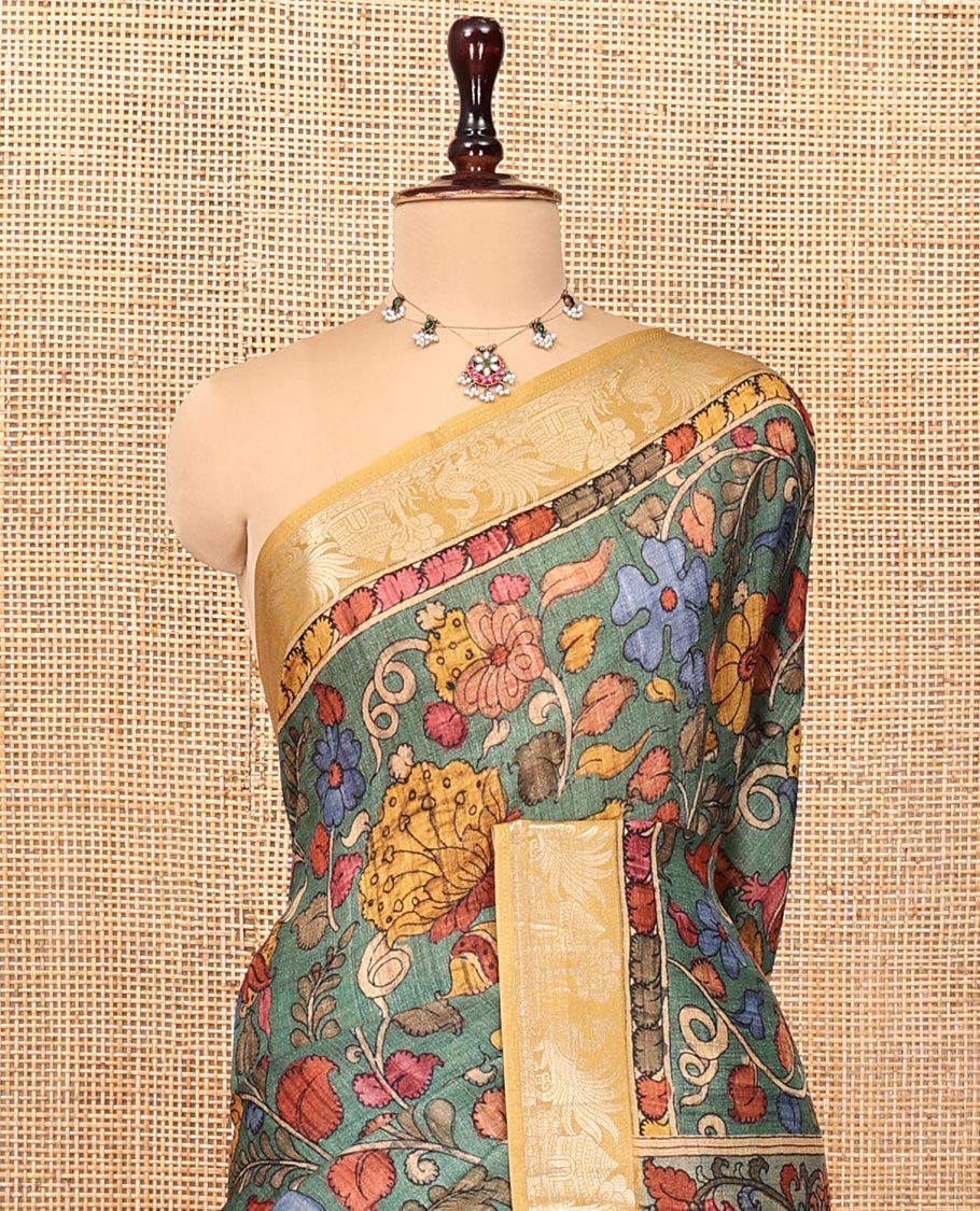 Green Kalamkari Saree, Beautified with Floral Vine Print, Complemented by Contrast Zari Border, Pallu of Flora-Fauna Print, and a Contrast Blouse
