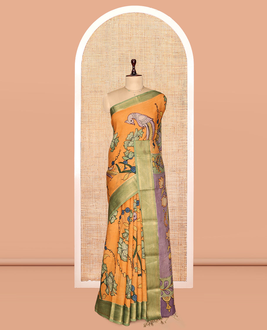 Orange Kalamkari Silk Saree, Lightly Embellished with Floral and Human Figurines, a Contrast Traditional Border, Pallu of Musical Instruments, and a Contrast Blouse