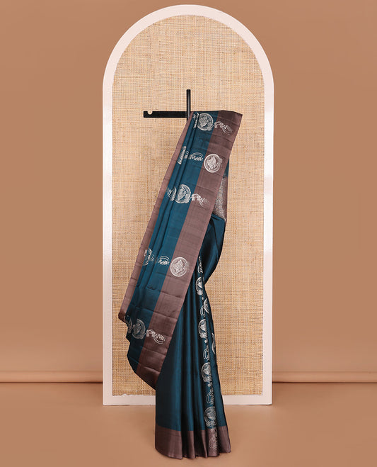 Blue Mayuri Soft Silk Saree Graced with Butterfly and Floral Buttas All Over the Body, Complemented by a Contrast Border Mirroring the Same Design, Pallu of Leaf Vine Designs, and Paired with a Contrast Blouse